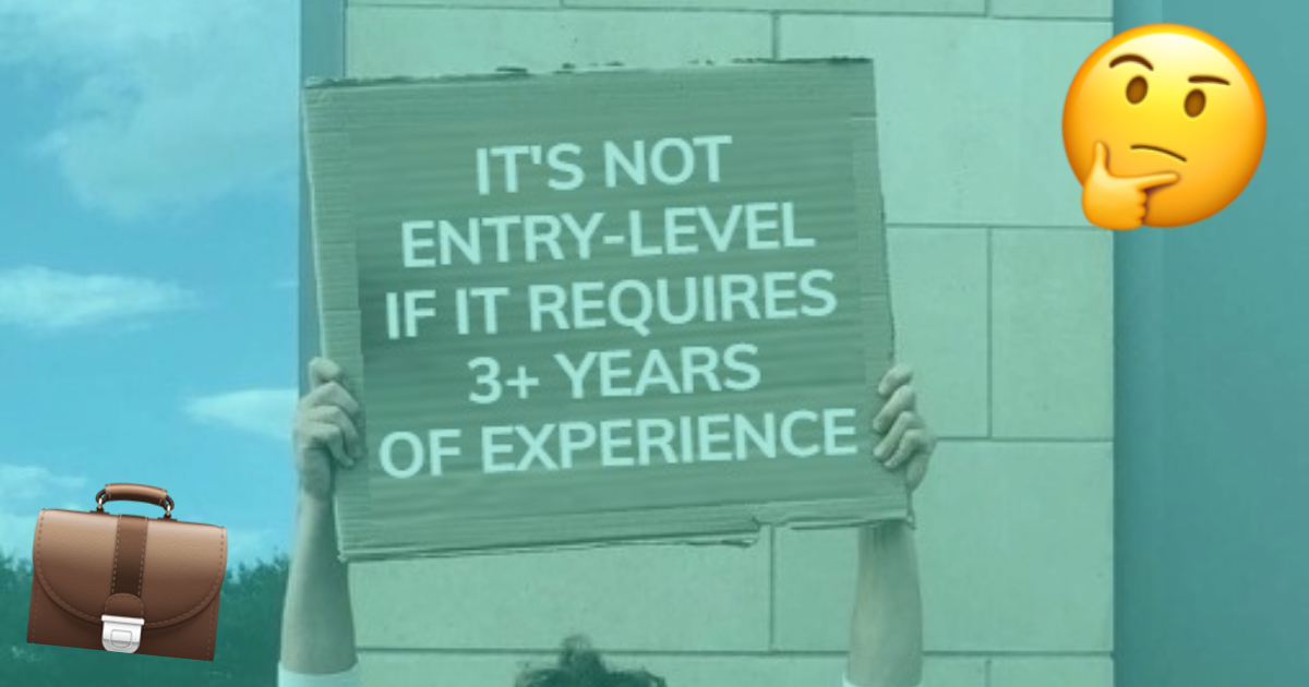 Man holding a sign saying "IT'S NOT ENTRY-LEVEL IF IT REQUIRES 3+ YEARS OF EXPERIENCE"